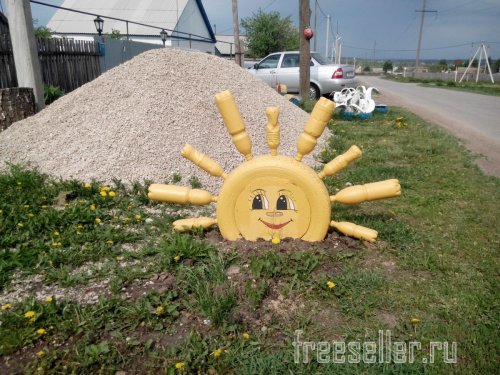 Поделки из покрышек. Солнышко из шин своими руками