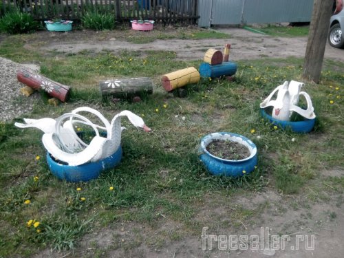 Поделки и самоделки из шин. Лебеди из покрышек своими руками.