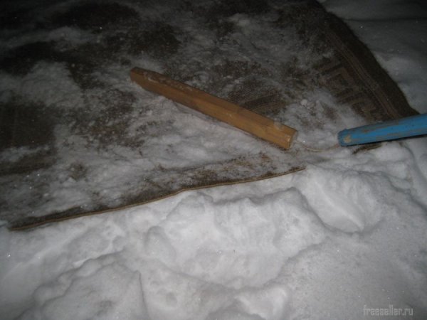 Приспособление в виде цепа для выбивания половиков