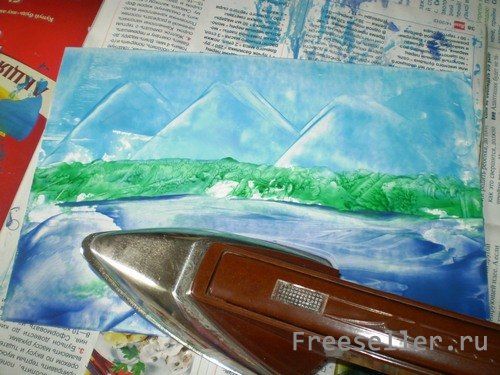 Процесс рисования картины утюгом